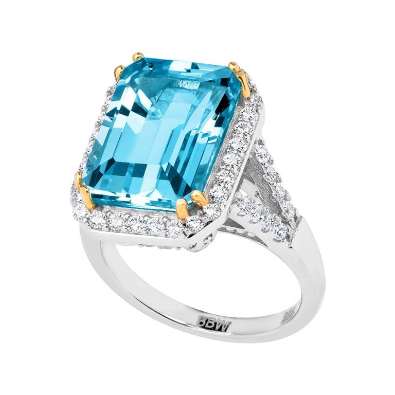 “Sterling Silver 8 Carat Blue Topaz Emerald-Cut Ring with 18 KGP Prongs ...